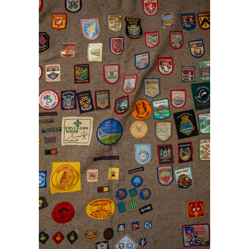 311 - Scouting interest. A Scout blanket, circa 1960s/70s, applied with a large collection of badges