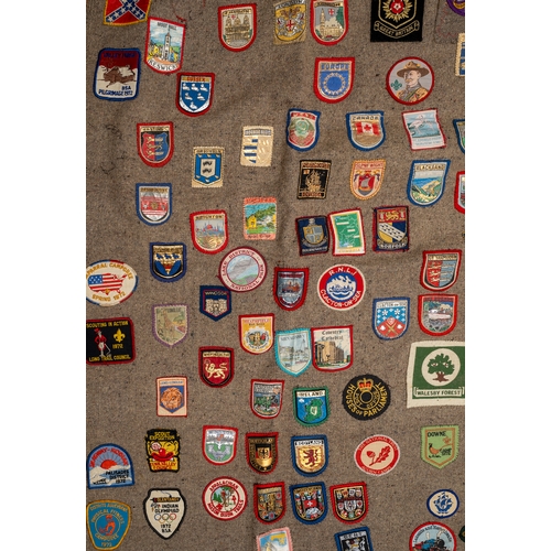 311 - Scouting interest. A Scout blanket, circa 1960s/70s, applied with a large collection of badges