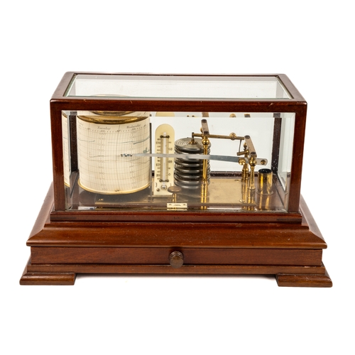 322 - A mahogany cased barograph, with bevelled glass and drawer, complete with charts, premium model with... 