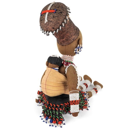 338 - A vintage South African beaded felt doll, of a mother and a child, approx 43cm high