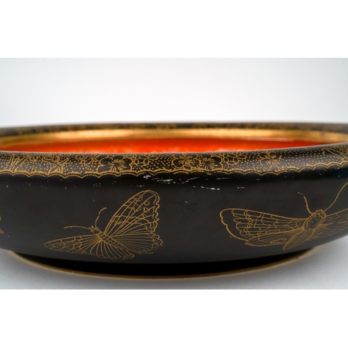 376 - A Carlton Ware Armand Lustre Ware bowl, decorated with gold butterflies and moths on a black ground,... 