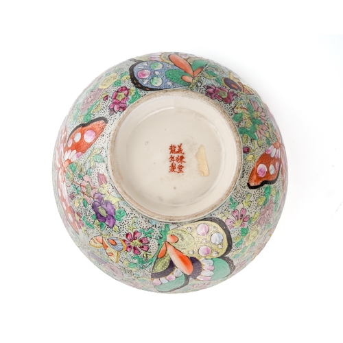 378 - A large Chinese famille rose bowl, enamelled with butterflies, approx 12cm high x 25.5cm diam, six r... 