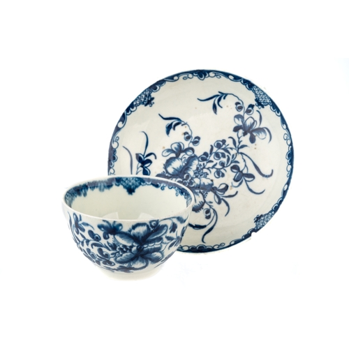 380 - An 18th century Worcester blue and white tea bowl and saucer, the saucer having a crescent back stam... 