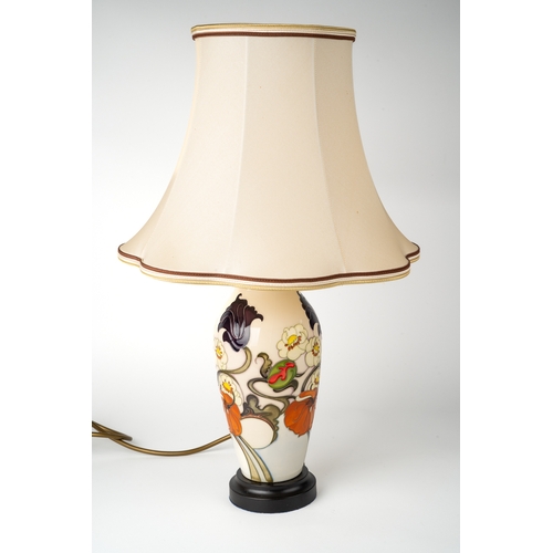 390 - A Moorcroft 'Sandringham Bouquet' pattern lamp, designed by Emma Bossons, on a wooden base, approx 2... 