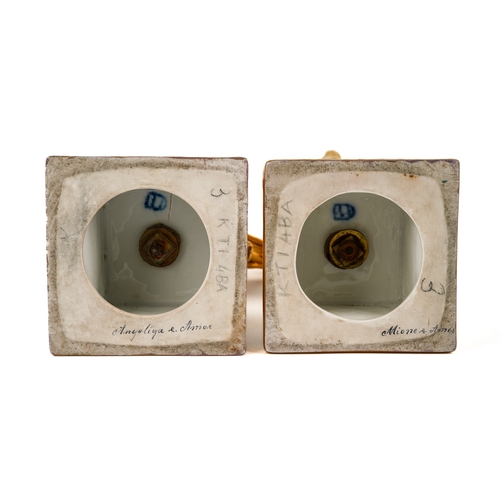 404 - A pair of late 19th century Vienna porcelain pedestal ewers, each of Neo-Classical tapering outline ... 