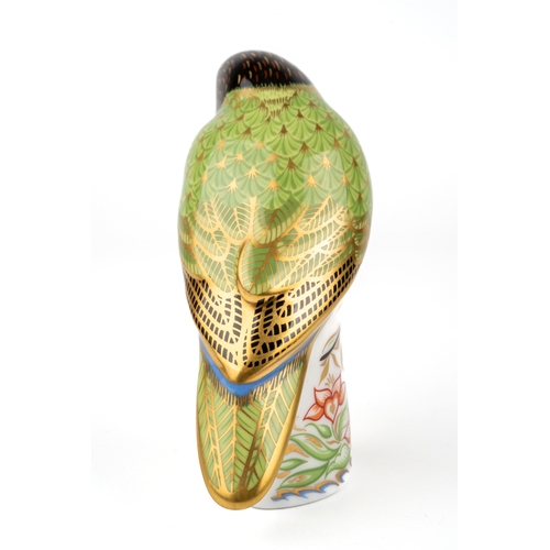 405 - A Royal Crown Derby black faced love bird, limited edition of 2500. Signed with gold stopper