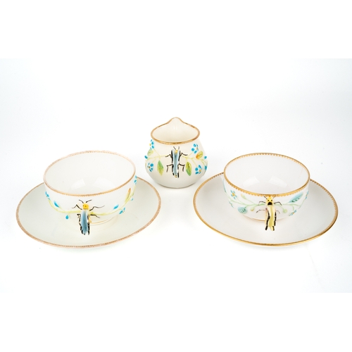 411 - Two Coapland China cups and saucers, butterfly handles, together with a cream jug, marked to base, m... 