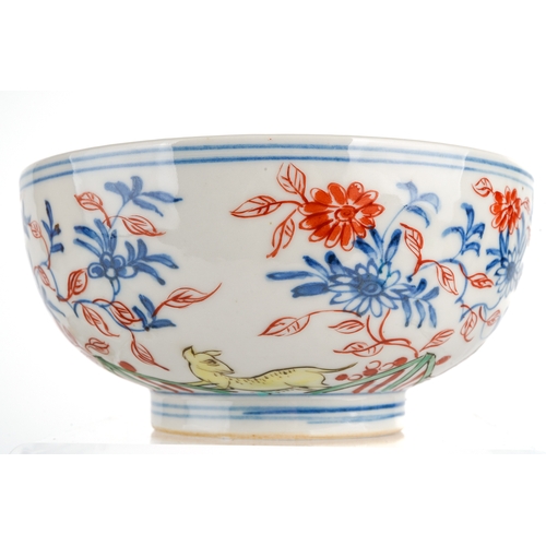 421 - A pair of Chinese bowls, decorated with animals amongst foliage, the inner bowls painted with flower... 