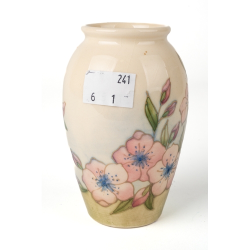 451 - A Moorcroft 'Spring Blossom' vase, designer Sally Tuffin, 1st quality, marked to base, approx 10.5cm