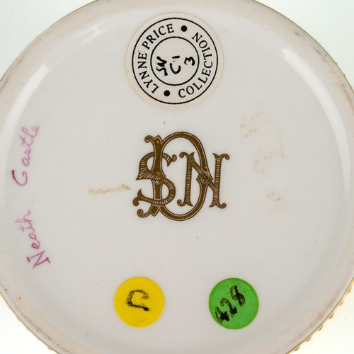 464 - Stefan Nowacki - a Derby pale-green-ground cabinet cup and saucer, painted with a view of Neath Cast... 