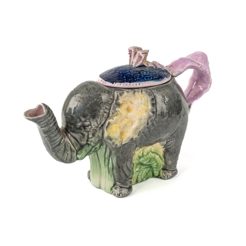 472 - A 19th century majolica tea pot in form of an elephant, approx 22cm long, 14cm high