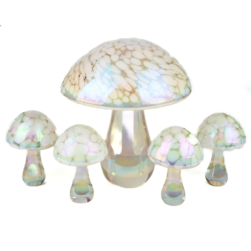 485 - A set of five iridescent glass mushrooms, tallest 15cm, other four 8cm high (5)