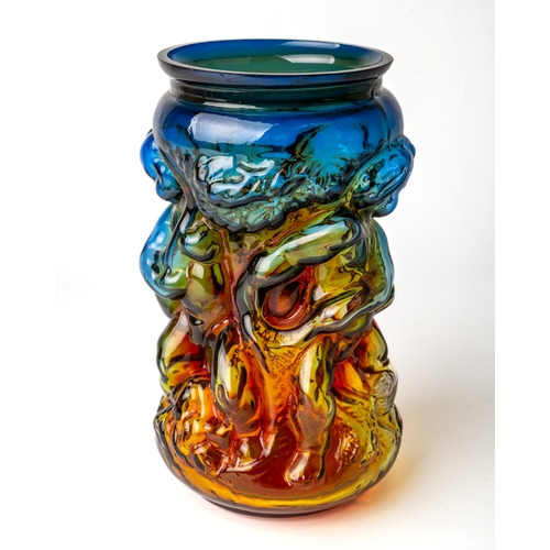 498 - Jan Gabrhel - Chlum u Trebone, a vari-coloured glass vase, molded with cherubs, orange/yellow/green/... 