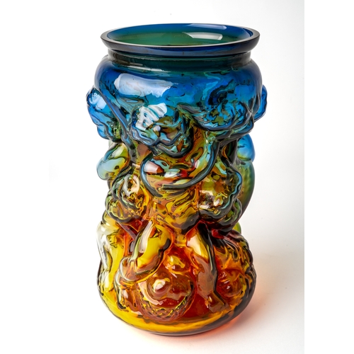 498 - Jan Gabrhel - Chlum u Trebone, a vari-coloured glass vase, molded with cherubs, orange/yellow/green/... 