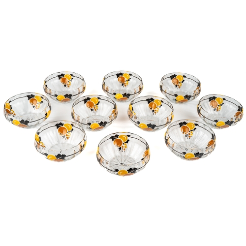 503 - A set of ten Marcel Goupy Art Deco glass bowls, enamelled with orange and green fruit within black b... 