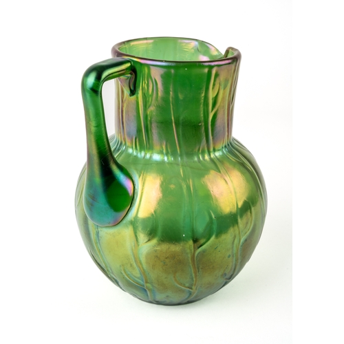 509 - An early 20th Century Loetz Neptune pattern green lustre water jug, the body relief molded with a st... 