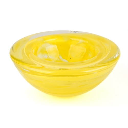 513 - A yellow Kosta Boda bowl with swirl design, 17.5cm diameter, 8cm high, with original label on