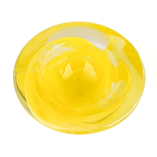 513 - A yellow Kosta Boda bowl with swirl design, 17.5cm diameter, 8cm high, with original label on