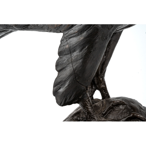 540 - Jeanne Rynhart (Irish 20th century) a limited edition bronzed figure group, depiciting a bird of pre... 