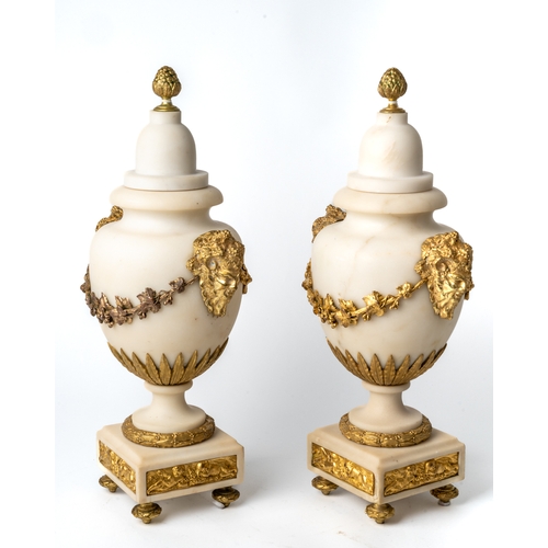 570 - A pair of ormolu and marble cassolettes with the heads of Baccas amongst vines, in the manor of Matt... 