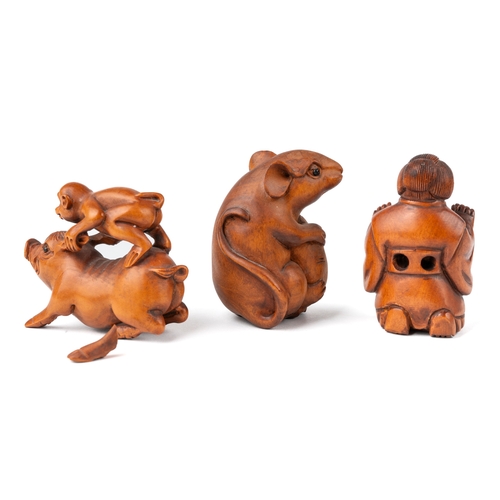 572 - Three Japanese carved netsuke - geisha, rat and a monkey riding a pig, 2 with signatures at base