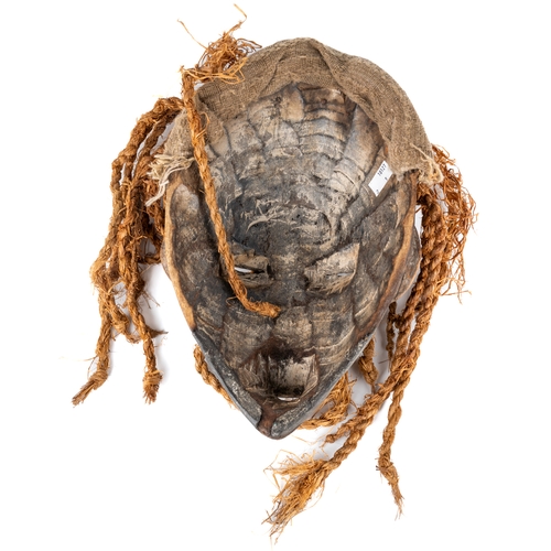 574 - African tribal mask with braided raffia 