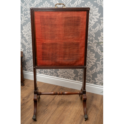 587 - A Regency mahogany rise and fall fire screen, rectangular embroidered panel depicting vase and spray... 