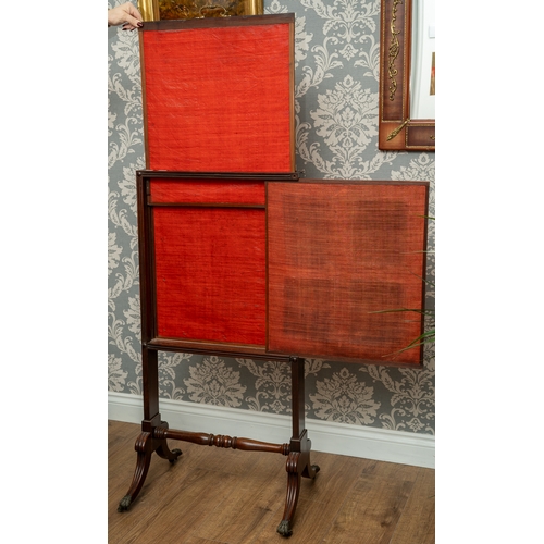 587 - A Regency mahogany rise and fall fire screen, rectangular embroidered panel depicting vase and spray... 