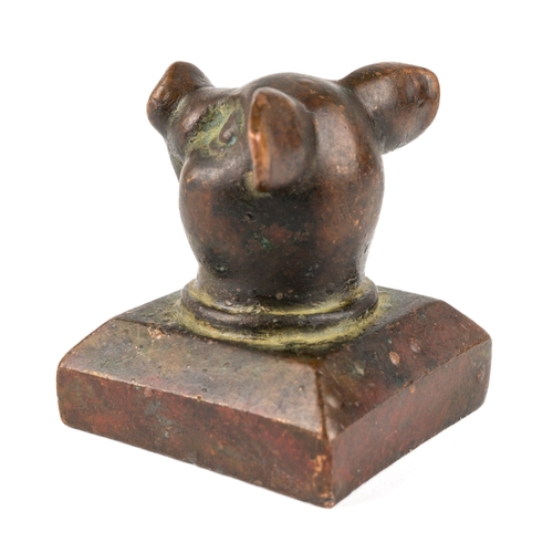 592 - A Chinese bronze desk seal in a form of a pigs head