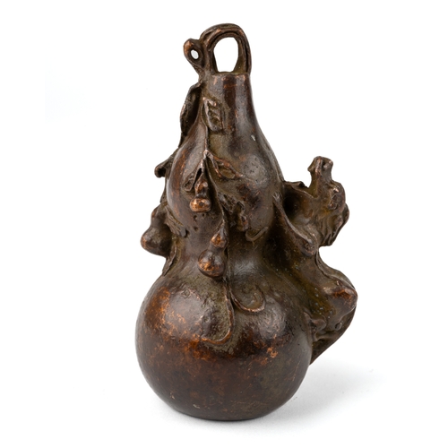 593 - Chinese bronze weight in a form of a gourd, two character marks to the base