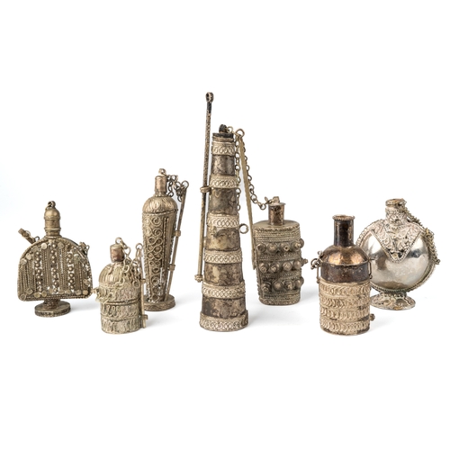 595 - A collection of 7 white metal bottles, probably North African. Tallest 13.5 cm