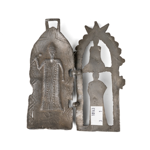 597 - A cast metal wall hanging shrine, the hinged front cast with figures opening to reveal a figure of a... 