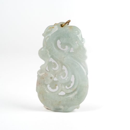 607 - A Chinese carved jade pendant, measures 55mm x 32mm