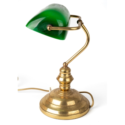 617 - A brass Bankers style desk lamp. Green glass shade, stands approx. 40 cm tall. Plug is detached, unt... 