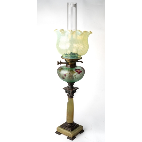 622 - An Antique oil lamp with green alabaster column and etched cameo glass front, with Vaseline glass sh... 