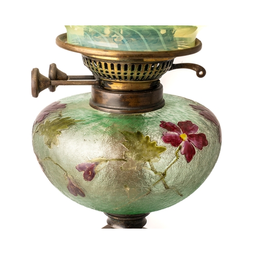 622 - An Antique oil lamp with green alabaster column and etched cameo glass front, with Vaseline glass sh... 