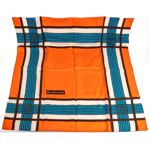 652 - Yves Saint Laurent silk scarf in orange, white and blue, 85 x 85cm