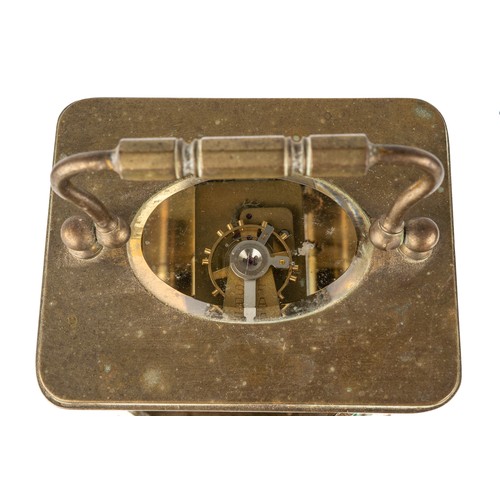 669 - A French brass eight-day carriage clock, with key