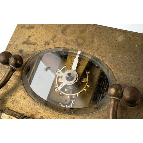 669 - A French brass eight-day carriage clock, with key