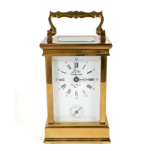 671 - A 20th century French repeating brass carriage clock by L’Epée, white enamel dial with Roman and Ara... 