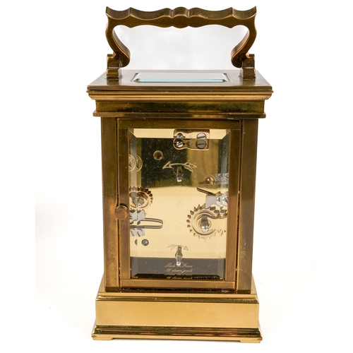 671 - A 20th century French repeating brass carriage clock by L’Epée, white enamel dial with Roman and Ara... 