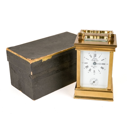 671 - A 20th century French repeating brass carriage clock by L’Epée, white enamel dial with Roman and Ara... 