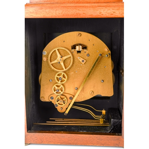 674 - An Elliott eight-day Westminster chime bracket clock, in walnut case, having platform escapement