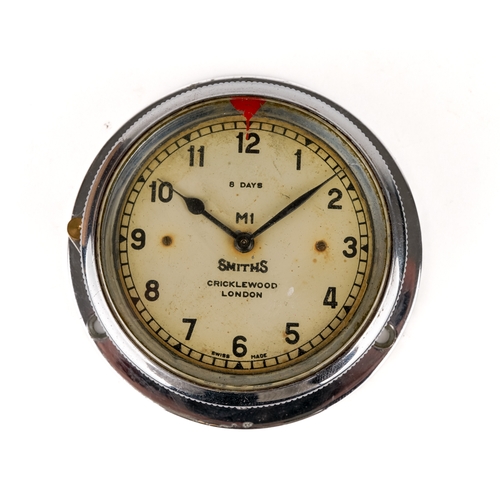 675 - A Smiths bezel wind car clock in chrome case, approx 7.3cm diameter