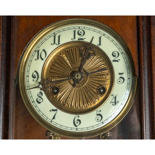 683 - A German springer wall clock with musical player, hourly disk comb player