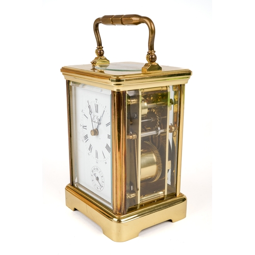 688 - A brass L'Epee repeating carriage clock, with alarm, original key, approx 14cm high without handle