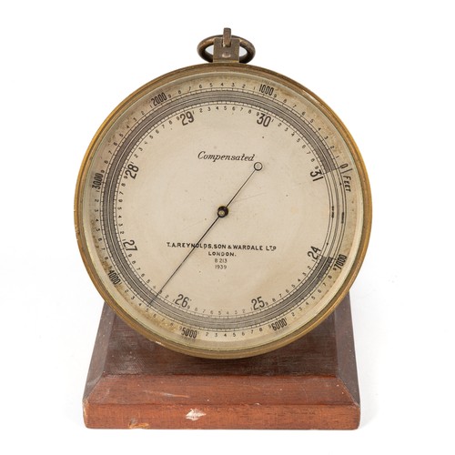 689 - WW2 era compensated aneroid barometer by TA Renolds.son and Wardale LTD, dated to dial 1939 on a woo... 