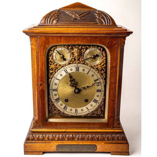 691 - An Edwardian bracket clock, in honey coloured oak, gilt metal detail to face, key to front and back ... 