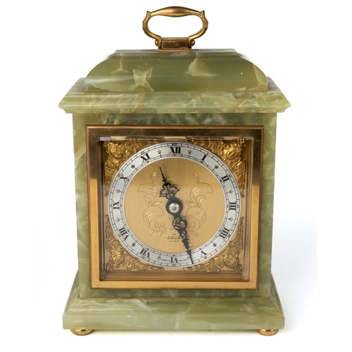 696 - An Elliott of London mantle clock, green onyx body. Approx. 18 cm tall.