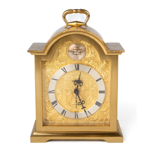 697 - A Swiza mantle clock, 15 Jewel, solid brass. Approx. 16 cm tall.